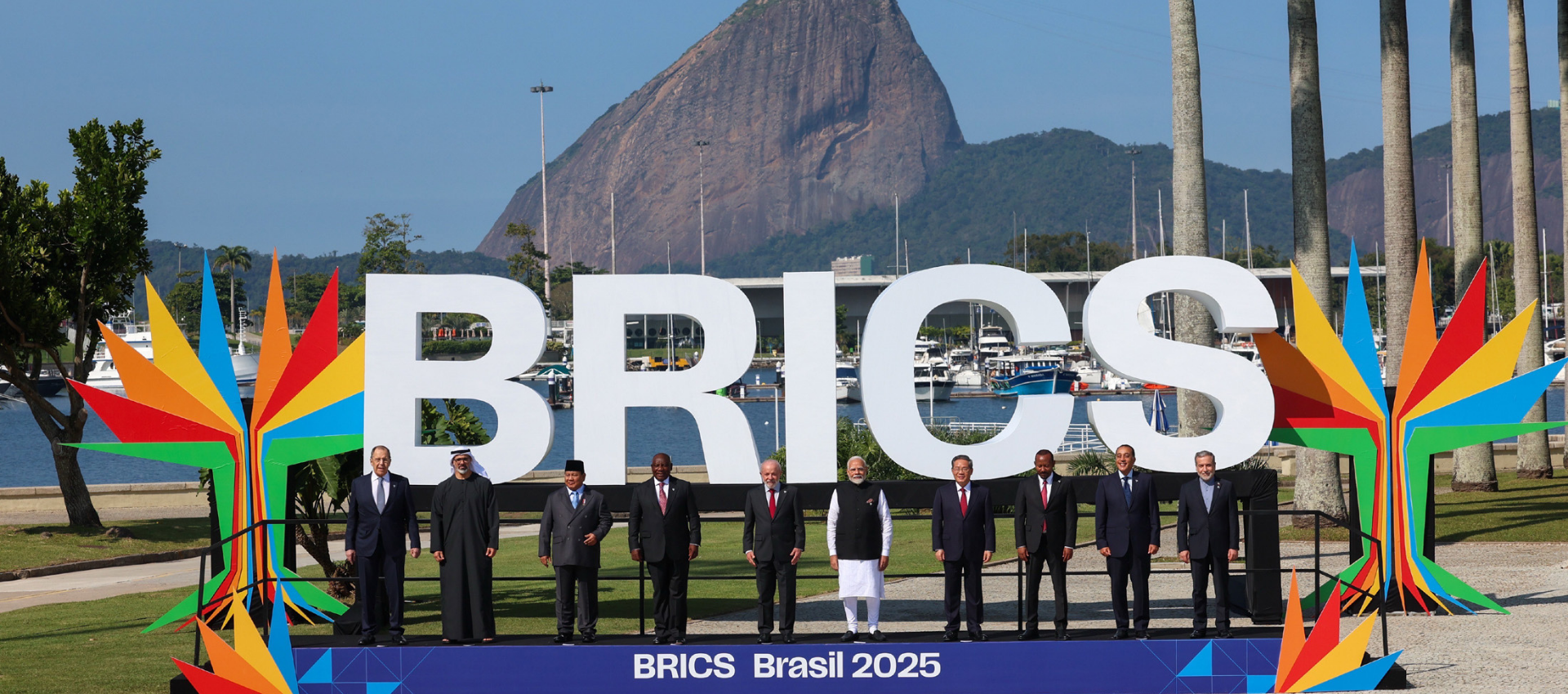 BRICS leaders pose for a group photo in front of a large BRICS sign in Rio de Janeiro, Brazil.